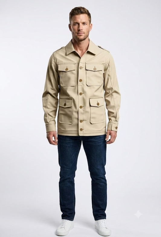 Scarlett Stitch Men's beige cotton blend safari utility jacket with multiple flap pockets and epaulets.