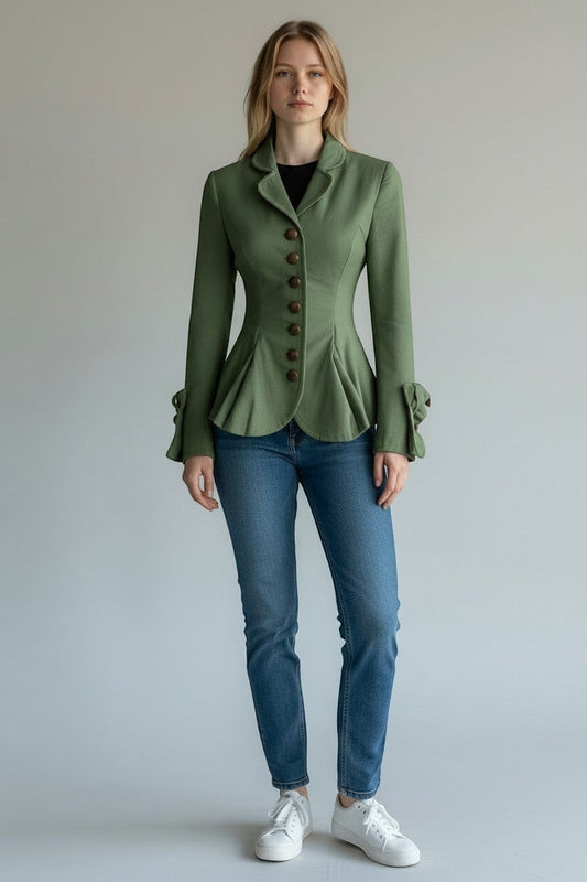 Scarlett Stitch sage green tailored peplum jacket with button detail and bow cuffs, worn by a model with jeans.