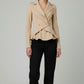 Scarlett Stitch beige double-breasted peplum blazer with asymmetrical wrap and lapel collar.