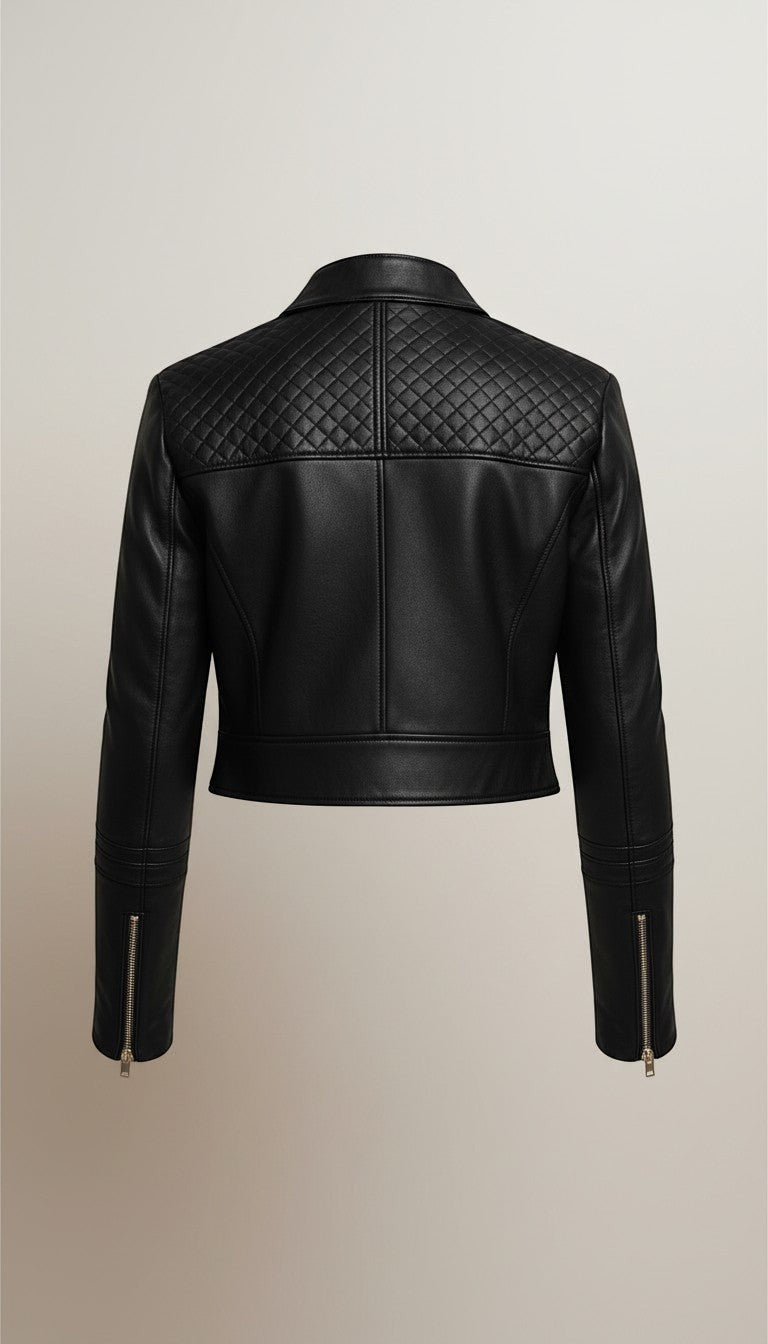 Scarlett Stitch black faux leather cropped moto jacket with diamond quilting on shoulders and zippered cuffs.