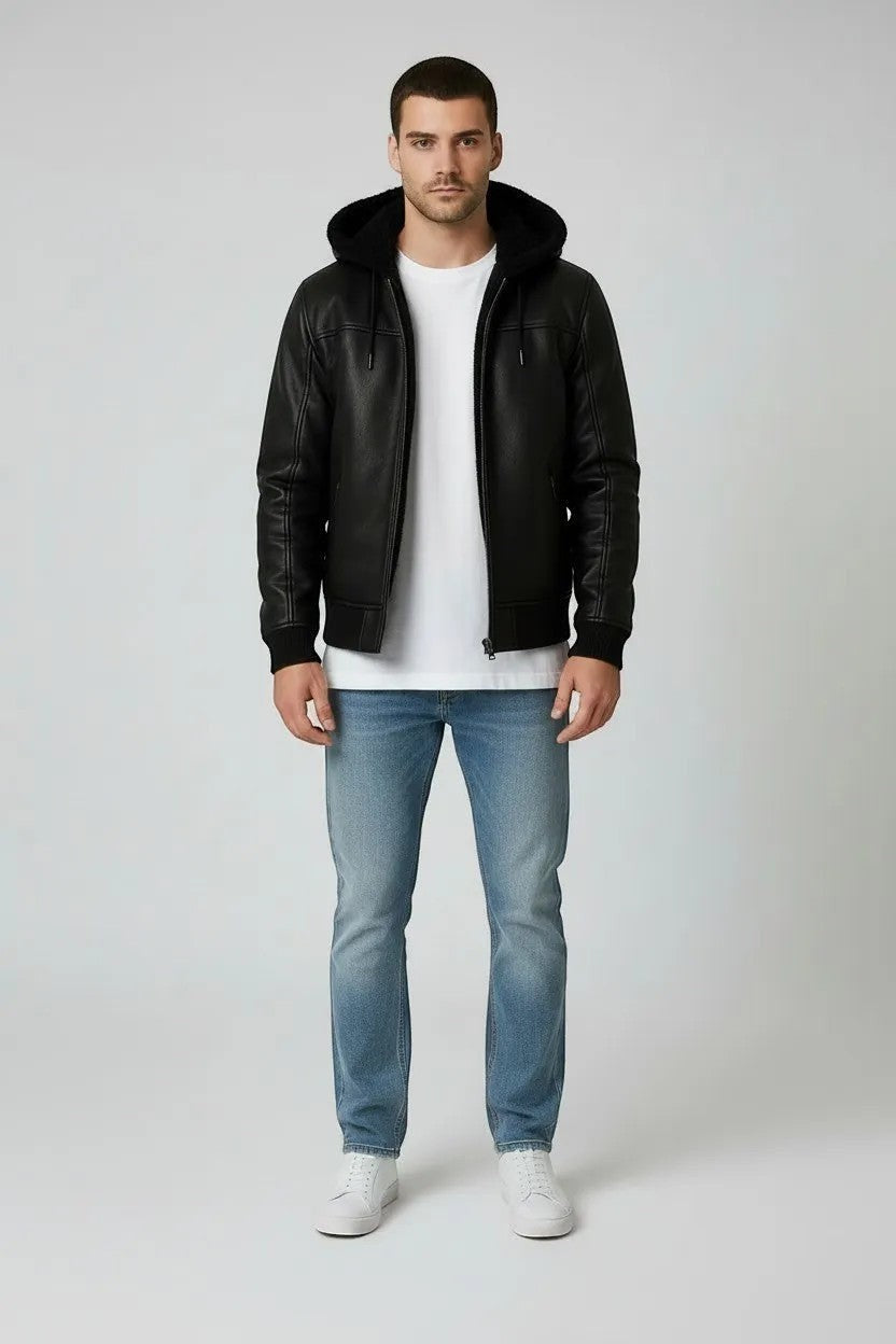 Scarlett Stitch black faux leather hooded bomber jacket with sherpa lining, ribbed cuffs and hem.