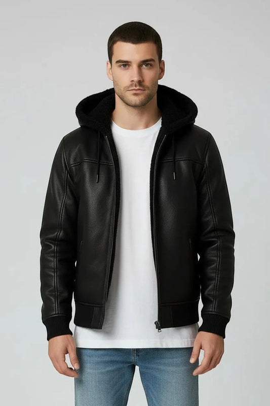 Scarlett Stitch Men's black faux leather bomber jacket with sherpa-lined hood and ribbed cuffs.