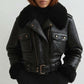 Scarlett Stitch black faux leather cropped moto jacket with faux shearling collar and cuffs, belt detail.