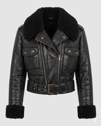 Scarlett Stitch black faux leather cropped moto jacket with faux shearling collar and cuffs, asymmetrical zip, and buckle belt.