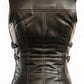 Scarlett Stitch black faux leather moto vest with lapel collar, zipper accents, and buckle tabs at hem. Tailored fit.