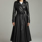 Scarlett Stitch black faux leather belted full skirt trench coat with wide lapels and double-breasted front.