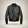 Scarlett Stitch black leather bomber jacket for men with ribbed collar, cuffs, and hem. Features a zip front and side pockets.
