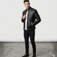 Scarlett Stitch men's black leather motorcycle jacket with quilted shoulders and mandarin collar on a male model.