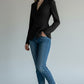 Scarlett Stitch women's black tailored fit blazer jacket with sharp lapels and three-button closure.