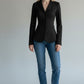 Scarlett Stitch women's black tailored fit blazer jacket with three-button closure and sharp lapels.