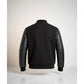 Scarlett Stitch Men's black wool-blend varsity jacket with genuine leather sleeves and ribbed trim.