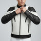 Scarlett Stitch men's black and white leather motorcycle jacket with quilted shoulder panels and snap-button collar.