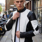 Scarlett Stitch men's black and white leather motorcycle jacket with quilted shoulder padding and mandarin collar.