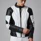 Scarlett Stitch men's black and white leather motorcycle jacket with quilted shoulder padding and mandarin collar.