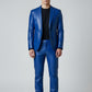 Scarlett Stitch royal blue faux leather suit jacket with notch lapels and two-button closure on a male model.