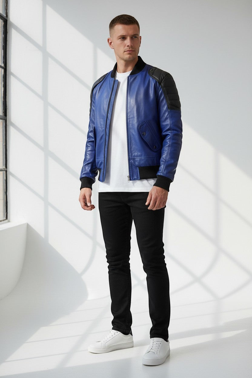 Scarlett Stitch men's royal blue leather bomber jacket with black accents and quilted detailing.