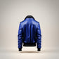 Scarlett Stitch royal blue leather bomber jacket with black ribbed collar, cuffs, and hem. Features epaulets and flap pockets.