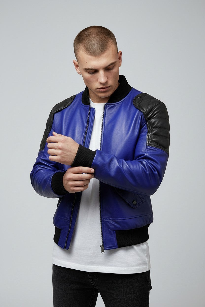 Scarlett Stitch men's royal blue leather bomber jacket with black quilted shoulders and ribbed collar, cuffs, and hem.