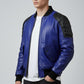 Scarlett Stitch men's royal blue genuine leather bomber jacket with black quilted shoulders and ribbed cuffs.