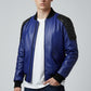 Scarlett Stitch men's royal blue leather bomber jacket with black quilted shoulders and ribbed cuffs.