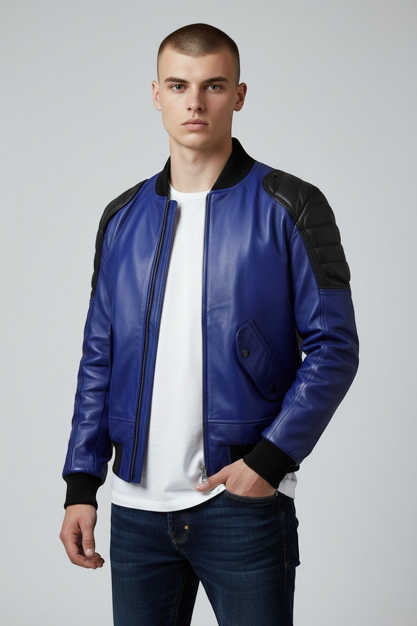 Scarlett Stitch men's royal blue leather bomber jacket with black quilted shoulders and ribbed cuffs.