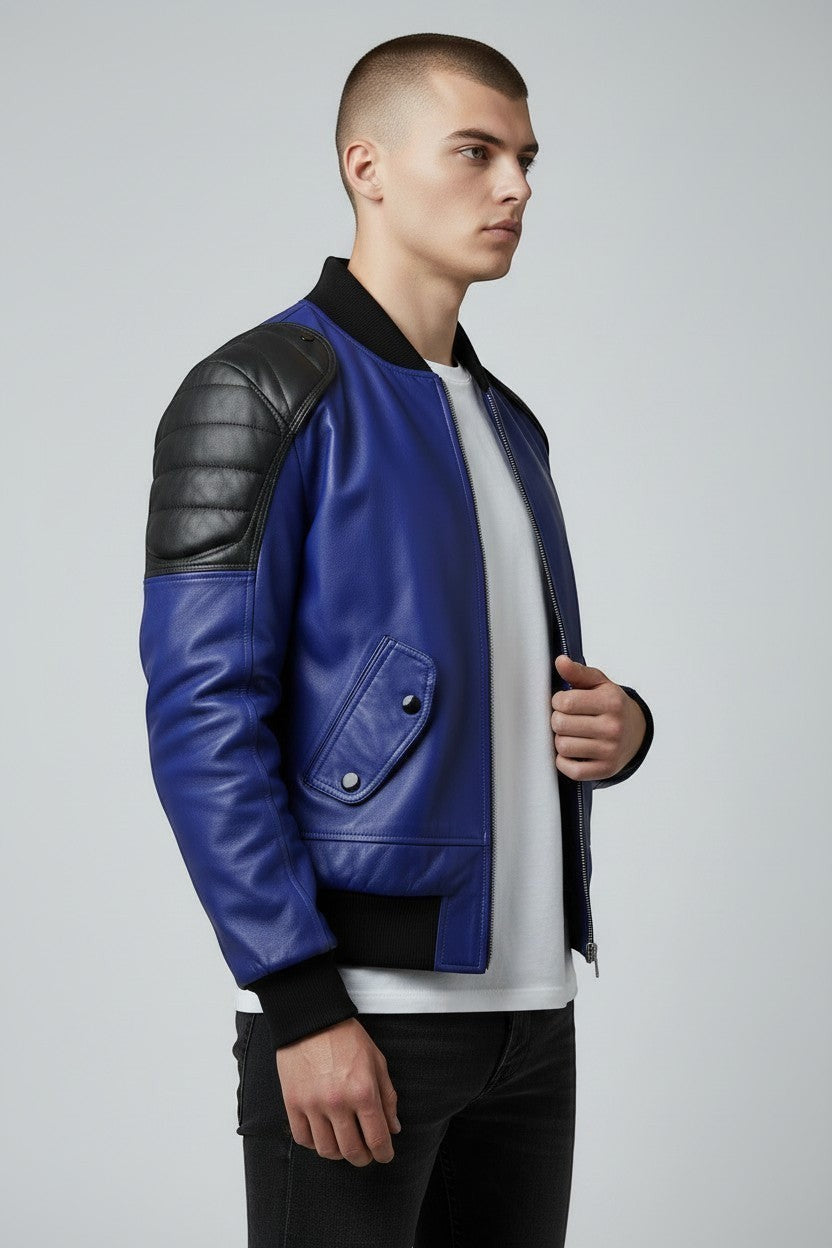 Scarlett Stitch Men's royal blue leather bomber jacket with black quilted shoulders and ribbed cuffs.