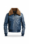 Scarlett Stitch men's blue leather bomber jacket with a brown faux-fur collar, ribbed cuffs, and zippered pockets.