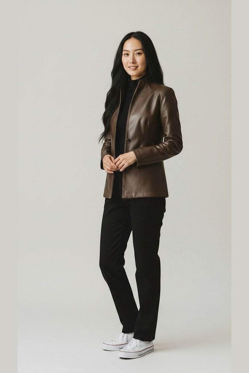 Scarlett Stitch brown faux leather collarless blazer jacket with button front and mandarin collar, worn by a woman.