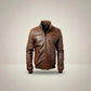Scarlett Stitch men's brown faux leather bomber jacket with stand-up collar, zip front, and quilted shoulder panels.