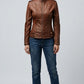 Scarlett Stitch brown faux leather moto jacket with zipper details, stand-up collar, and snap buttons.