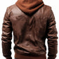 Back view of a Scarlett Stitch men's brown faux leather hooded jacket with ribbed hem and cuffs on a model.