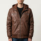 Scarlett Stitch men's brown faux leather hooded jacket with ribbed cuffs and silver zippers worn by a model.