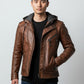 Scarlett Stitch brown distressed leather motorcycle jacket with a grey knit hood worn by a man on a white background