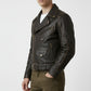 Scarlett Stitch dark brown leather biker jacket with contrast stitching, metal zippers, and waist belt on a model.
