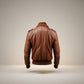 Scarlett Stitch Men's brown genuine leather bomber jacket with ribbed collar, cuffs, and hem. Features epaulets and flap pockets.