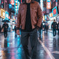 Scarlett Stitch Men's brown quilted faux leather bomber jacket with ribbed collar, cuffs, and hem.