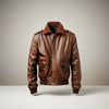 Scarlett Stitch Men's brown leather bomber jacket with ribbed collar, cuffs, and hem. Features dual chest pockets and side pockets.