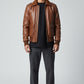 Scarlett Stitch Men's genuine leather bomber jacket in warm brown with ribbed collar, cuffs, and hem. Features zip front and flap pockets.
