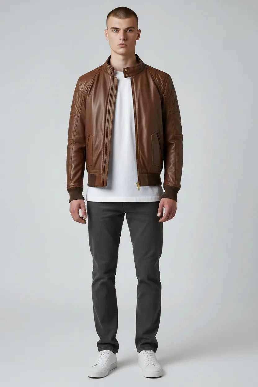 Scarlett Stitch Men's brown quilted genuine leather bomber jacket with stand collar and zip front.