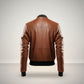 Scarlett Stitch men's brown quilted faux leather bomber jacket with ribbed collar, cuffs, and hem.