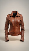 Scarlett Stitch women's classic brown leather motorcycle jacket with zippered cuffs and buckle tabs.