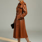 Scarlett Stitch brown leather trench coat with belt, double-breasted, epaulets, storm flap, flared skirt.