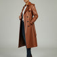 Scarlett Stitch classic brown leather trench coat with belt, double-breasted, epaulets, and storm flap.