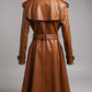 Scarlett Stitch classic brown leather trench coat with belt, double-breasted, epaulets, and flared skirt.