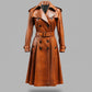 Scarlett Stitch classic brown leather trench coat with belt, double-breasted, flared skirt, and epaulets.