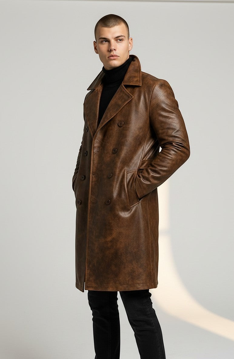 Scarlett Stitch men's brown distressed leather double-breasted trench coat worn over a black turtleneck