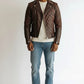 Scarlett Stitch men's brown quilted leather motorcycle jacket with asymmetrical zip and ribbed sleeve detailing.