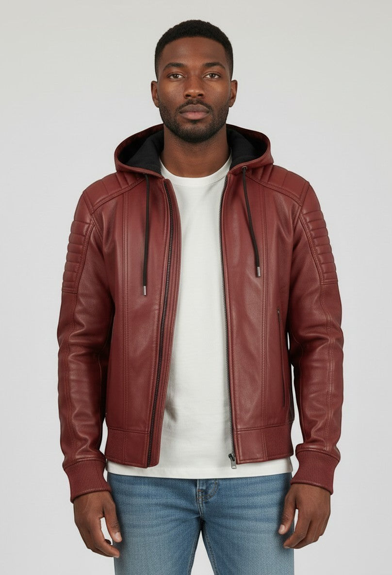 Scarlett Stitch men's hooded bomber jacket in deep burgundy leather with quilted shoulders and ribbed cuffs.