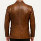 Back view of a Scarlett Stitch cognac brown leather blazer with structured tailoring and buttoned cuffs.