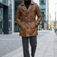 Scarlett Stitch men's cognac brown distressed leather double-breasted trench coat with belt and epaulettes